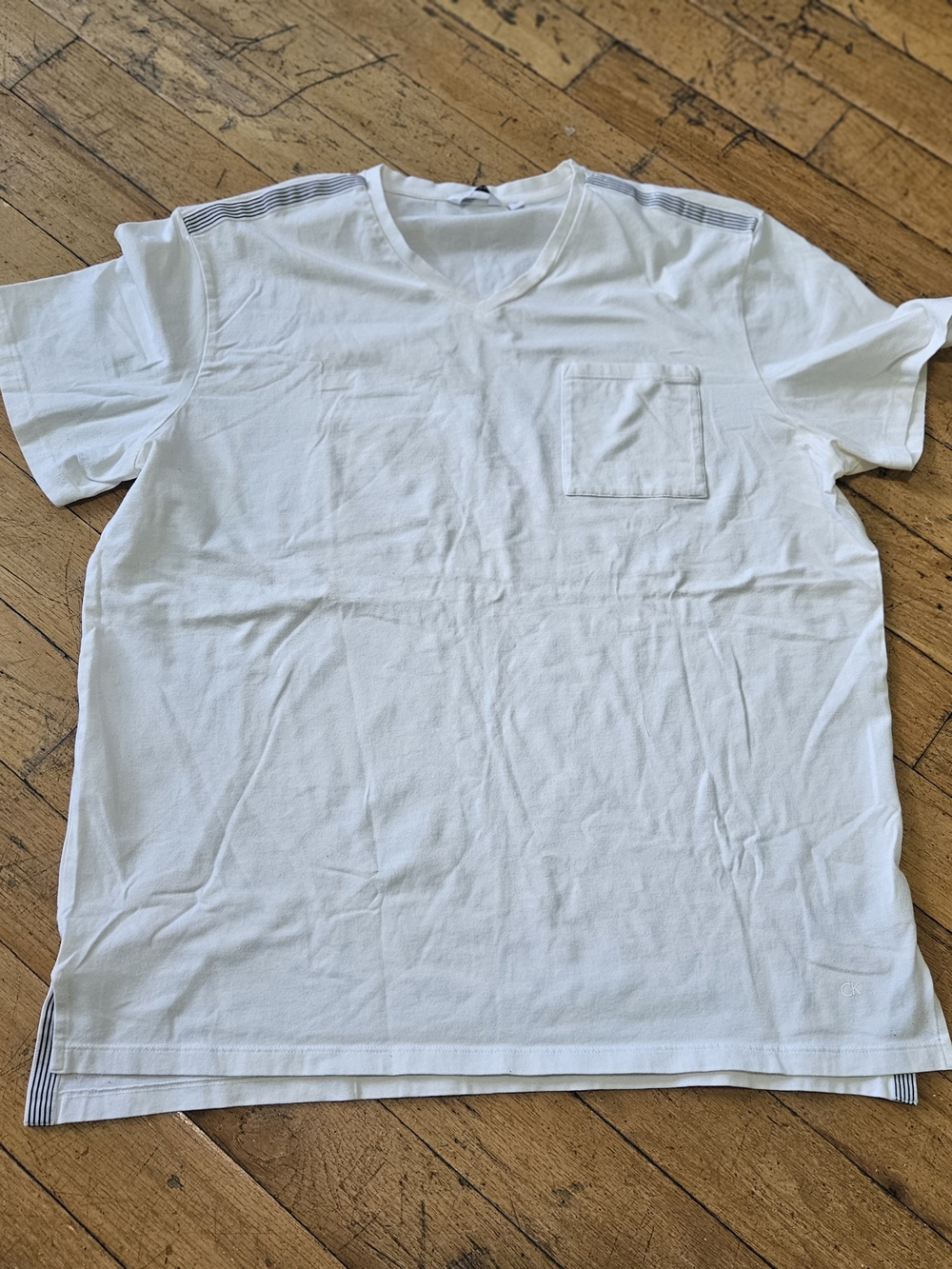 Calvin Klein White V-Neck Pocket Tee with Subtle Shoulder Stripes